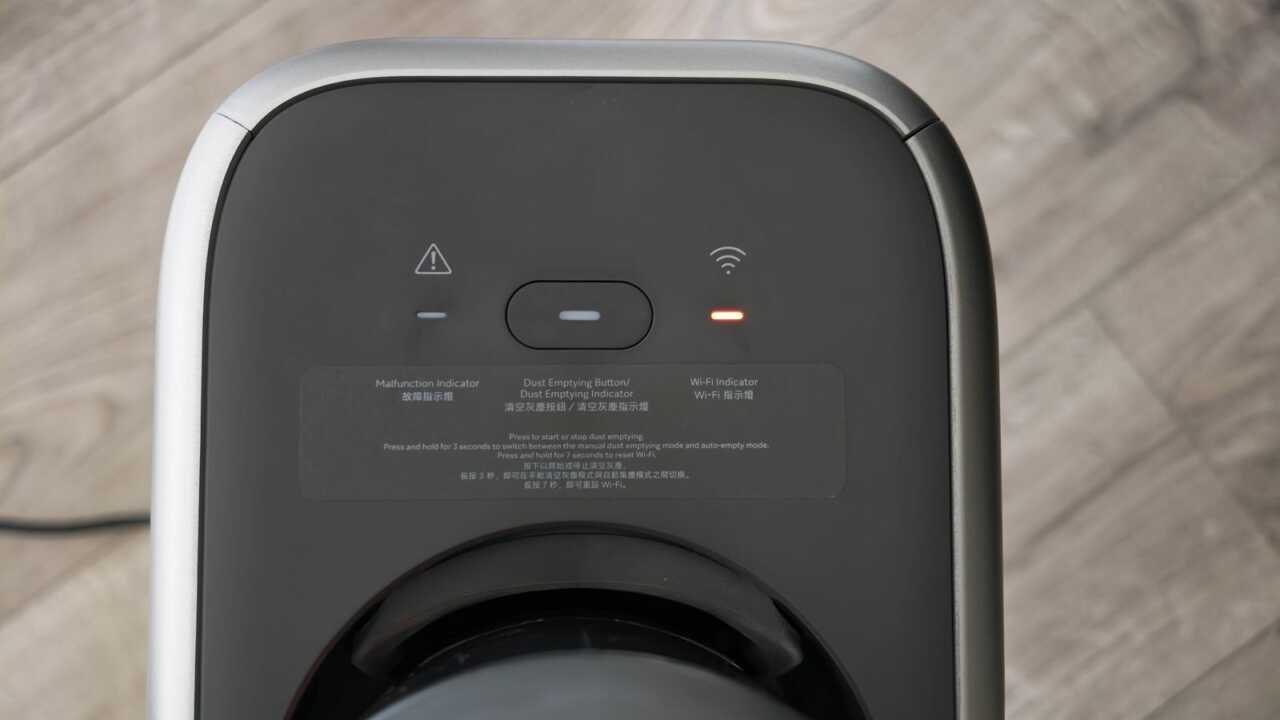 基座頂部按鍵、警示標示及 Wi-Fi 指示燈